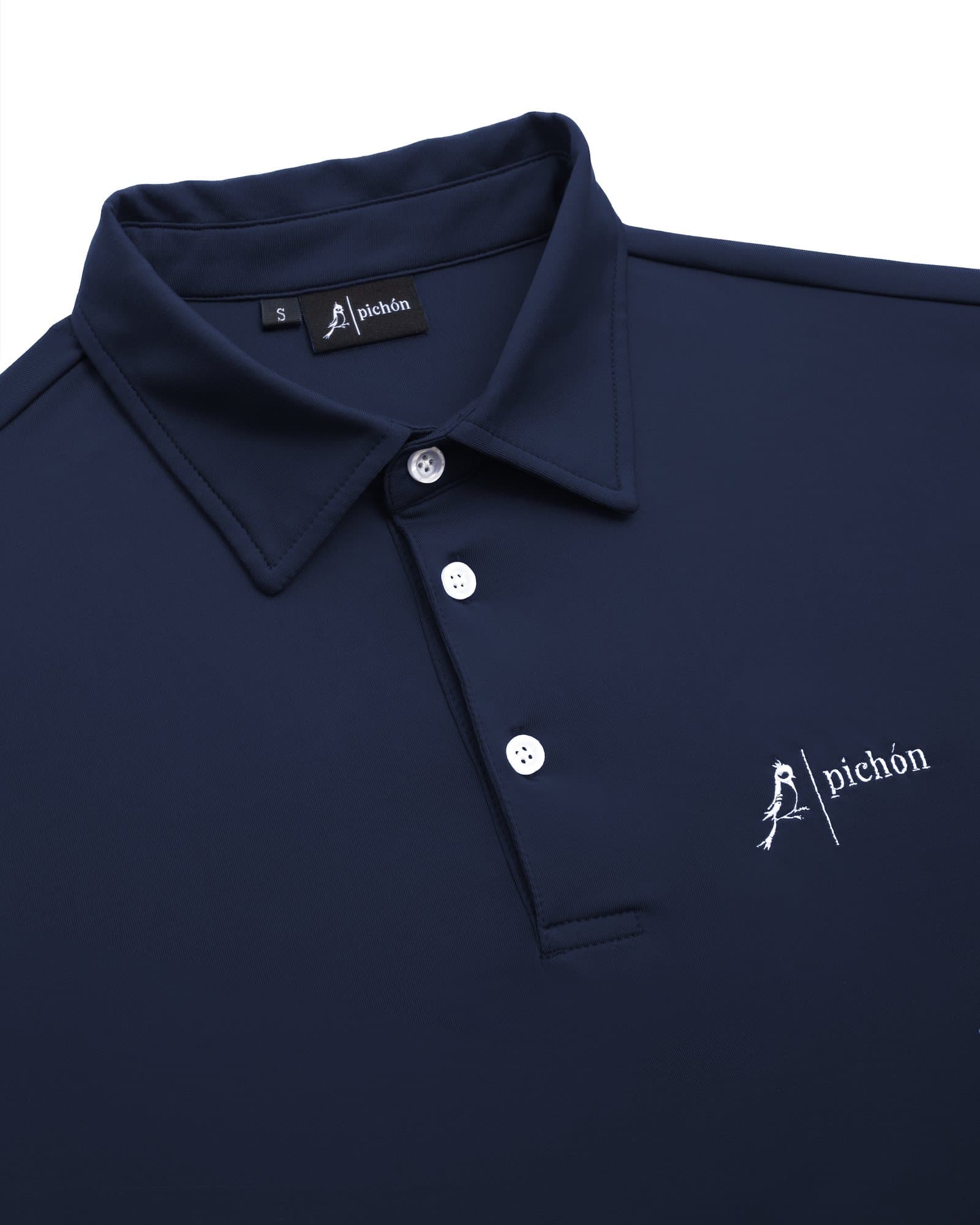 Close-up of the structured collar on a navy Pichón polo